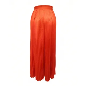 Detailed view of vibrant orange pleated satin high-waisted midi skirt fabric texture