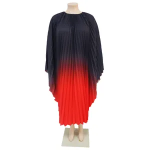 Detail showing the elegant pleated texture and black to red gradient on this plus size dress