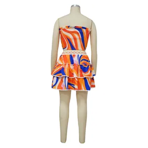 Back view of a vibrant swirl print two-piece set featuring a tube top and skirt