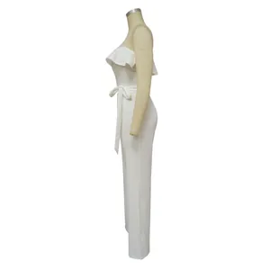 Side view of elegant white one-shoulder jumpsuit with ruffle trim and matching waist tie belt.