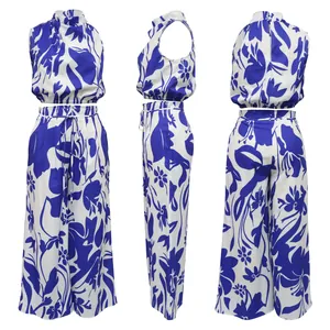 Detailed views of women's sleeveless floral crop top and wide-leg pants set