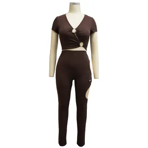 Brown ribbed two-piece set with V-neck cutout top and matching hollow-out leggings