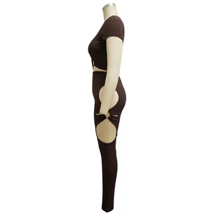 Side view of chocolate brown two-piece set with ribbed texture and side cut-outs