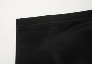 Detailed macro view showing the high-quality stitching on a black women fishtail skirt