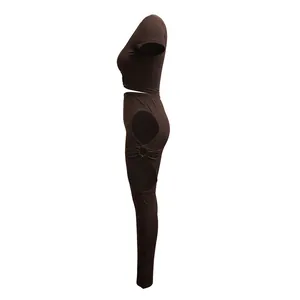 Side view showing ring cutout detail on leggings of chocolate brown two-piece set