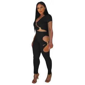Detailed view of women's black V-neck short-sleeve set with side cut-out pants