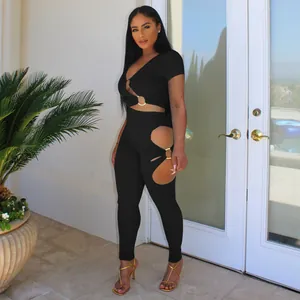 Sexy black two-piece set with V-neck top and side cutout leggings with metal rings