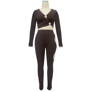 Detail view of dark brown ribbed two-piece set with V-neck crop top and leggings.