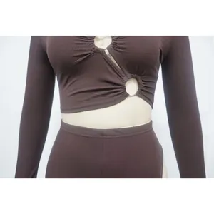 Close-up of a ribbed long sleeve two-piece set featuring a sexy V-neck and ring detail