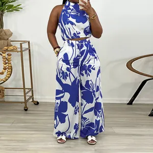 Detail view of stylish blue and white floral print sleeveless top and wide-leg pants set.
