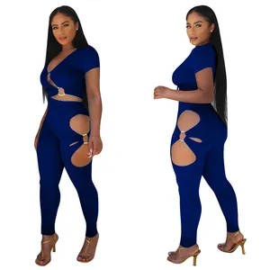 Navy blue two-piece set for women featuring V-neck crop top and cut-out leggings