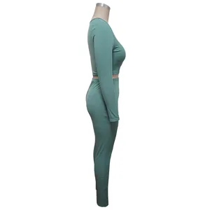 Side view of premium sage green rib-knit two-piece set with crop top and leggings