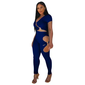 Detail view of navy blue two-piece set with rib-knit fabric and decorative metal rings