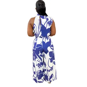 Back view of a chic women's sleeveless jumpsuit with bold blue and white floral patterns.