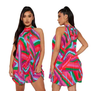 Detailed view of vibrant pleated halter neck mini dress with colorful geometric print