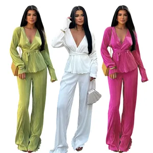 Vibrant pleated two-piece sets for women featuring deep V-neck tops and wide-leg trousers