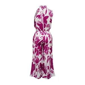 Back view of stylish sleeveless wide-leg jumpsuit featuring magenta floral print pattern