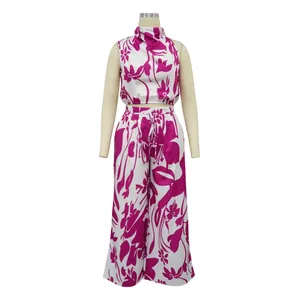 Trendy women's two-piece set featuring sleeveless top and wide-leg floral print pants outfit