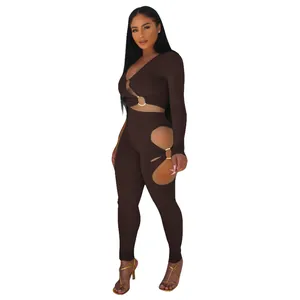 Full length view of the brown ribbed two-piece set showing cutout details and gold rings