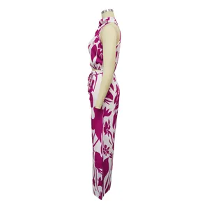 Side profile of a white and magenta floral sleeveless crop top and matching trousers