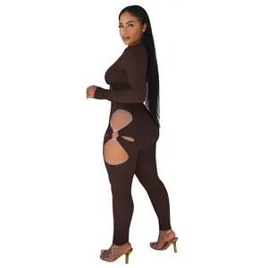 Side view of brown ribbed knit jumpsuit featuring sexy hollow-out ring detail