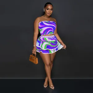 Two-piece set featuring strapless tube top and ruffled skirt in vibrant purple swirl print