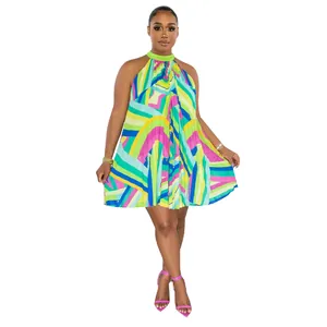 Full view of a vibrant multi-color pleated halter dress with geometric abstract patterns