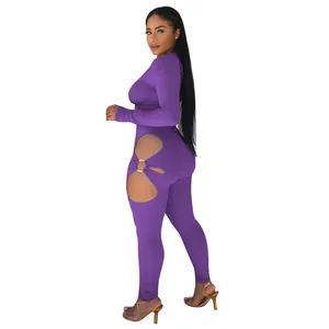 Detailed view of sexy purple ribbed two-piece set featuring stylish side cut-outs.