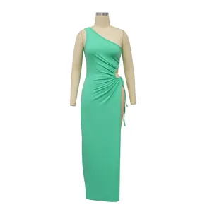 Detail of mint green one-shoulder ribbed maxi dress with side cutout and high slit