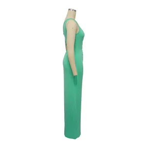 Detailed side view of a mint green rib-knit one-shoulder bodycon maxi evening dress