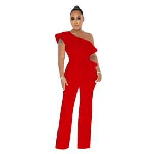 Red one-shoulder jumpsuit featuring elegant ruffled details and a matching waist belt