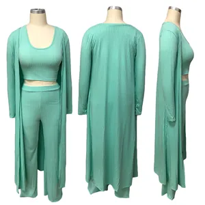 Mint green ribbed three-piece set shown from front, back, and side views for detailed look.