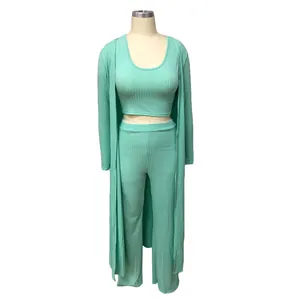Mint green ribbed three-piece set with crop top, pants, and long cardigan sweater