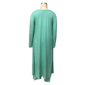 Detailed back view of a long mint green ribbed knit cardigan with high stretch fabric texture.
