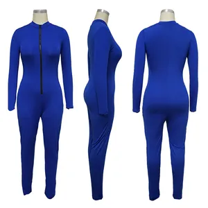 Front, side and back views of a royal blue slim-fit long-sleeve jumpsuit with front zipper.