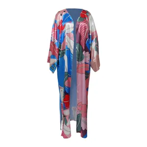 Full front view of a long-sleeved floral print kimono cardigan with vibrant leaf patterns