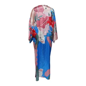 Back view of a colorful printed kimono cardigan featuring floral and animal motifs