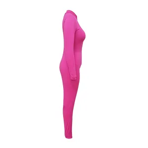 High-quality side view profile of a vibrant pink long-sleeve skinny bodysuit for women.