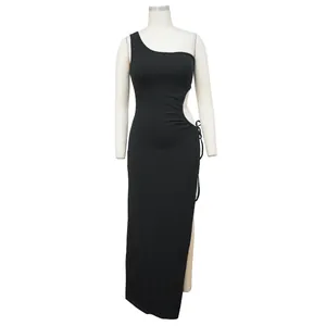 Close-up of a black one-shoulder ribbed maxi dress with side slit and waist cutout