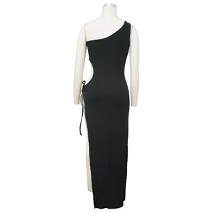 Close-up back view of a sexy black one-shoulder ribbed maxi dress with side cutout