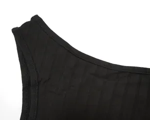 Detailed close-up view of black ribbed high-stretch fabric with clean stitching finish