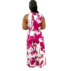 Back view of women's sleeveless floral jumpsuit with wide-leg pants in fuchsia print.