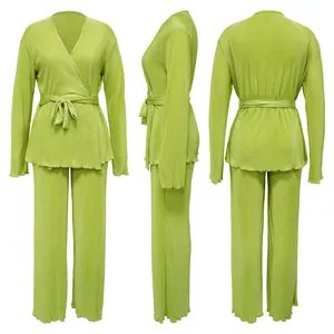 Front, side, and back views of a lime green pleated long sleeve leisure clothing set