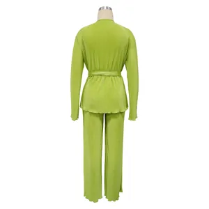 Back view of a vibrant lime green pleated long-sleeved casual two-piece outfit set