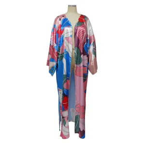 Close-up detail of women's bohemian floral print long sleeve loose casual kimono robe