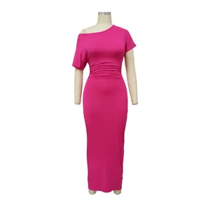 Detail view showing hot pink ruched one-shoulder bodycon maxi dress on a studio mannequin.