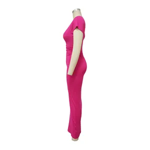 Side profile view of a vibrant fuchsia ruched slim fit maxi dress on a mannequin display