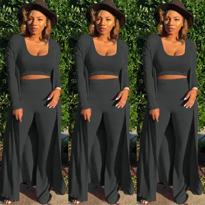 Detailed view of ribbed 3-piece set with long cardigan, crop top, and flared pants.