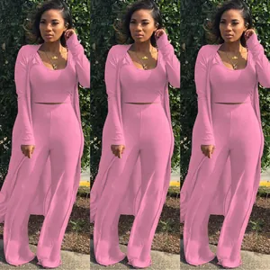 Chic pink 3-piece ribbed knit set with cardigan, crop top, and wide-leg pants