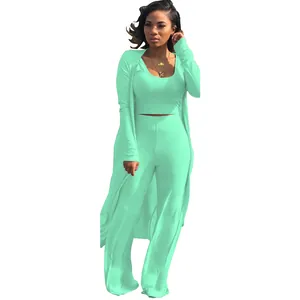 Detailed view of women's mint green ribbed three-piece knit cardigan and pants set